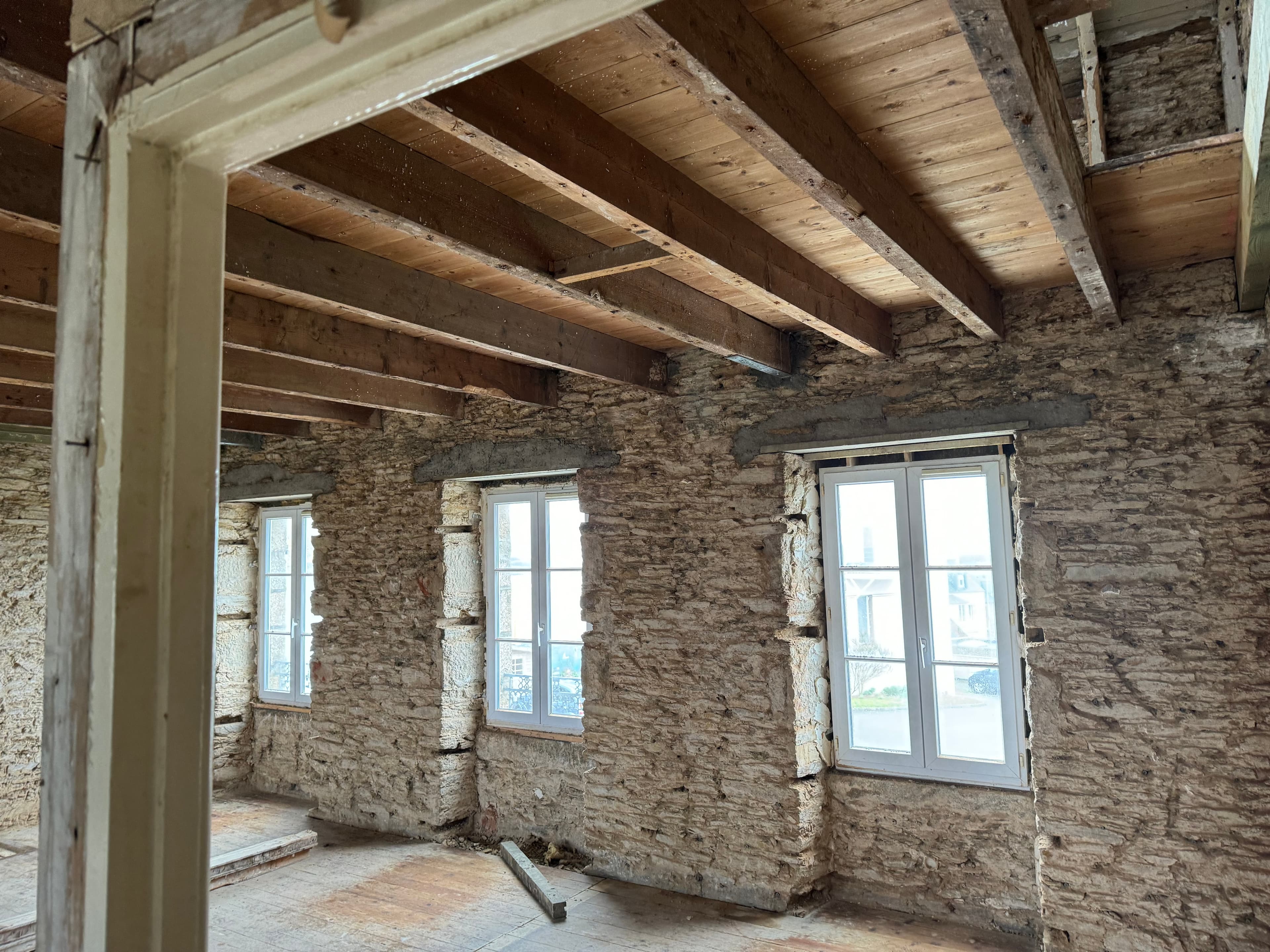 Reprise des sections de bois en charpente